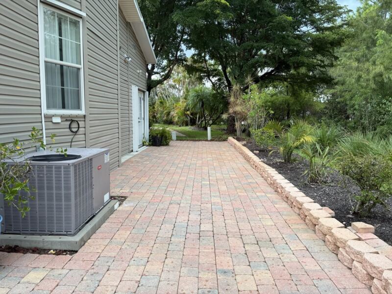 Pressure-washed paver walkway and retaining wall