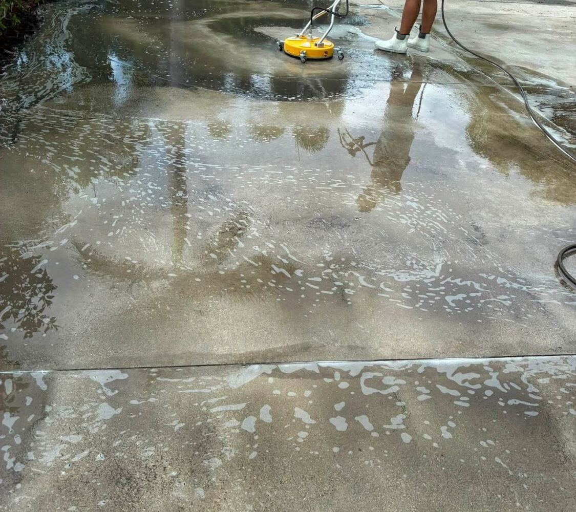 Cleaning a concrete driveway with a surface cleaner
