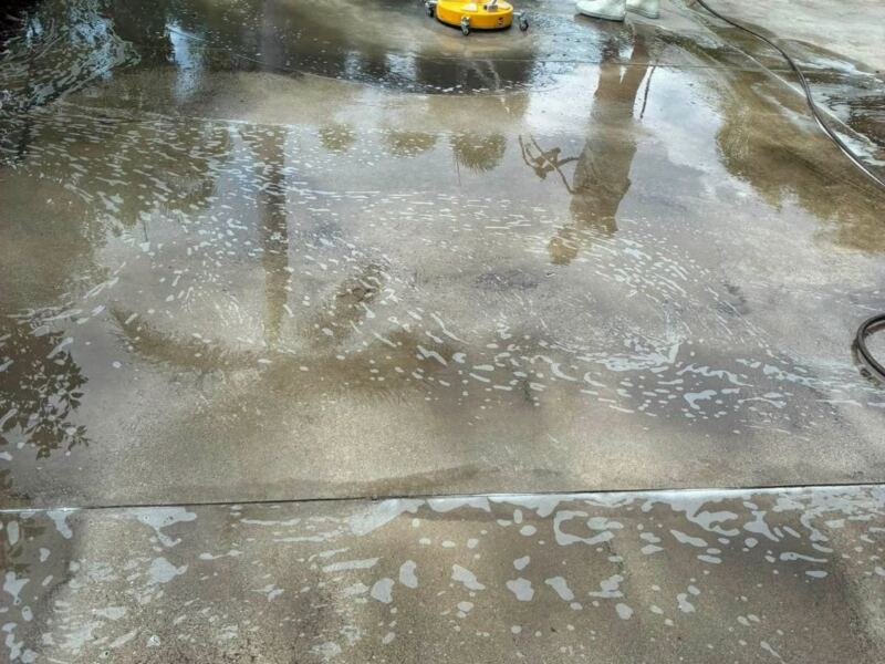 Cleaning a concrete driveway with a surface cleaner