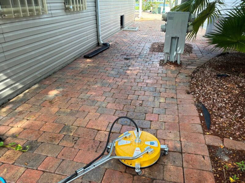 Surface cleaner washing a paver walkway