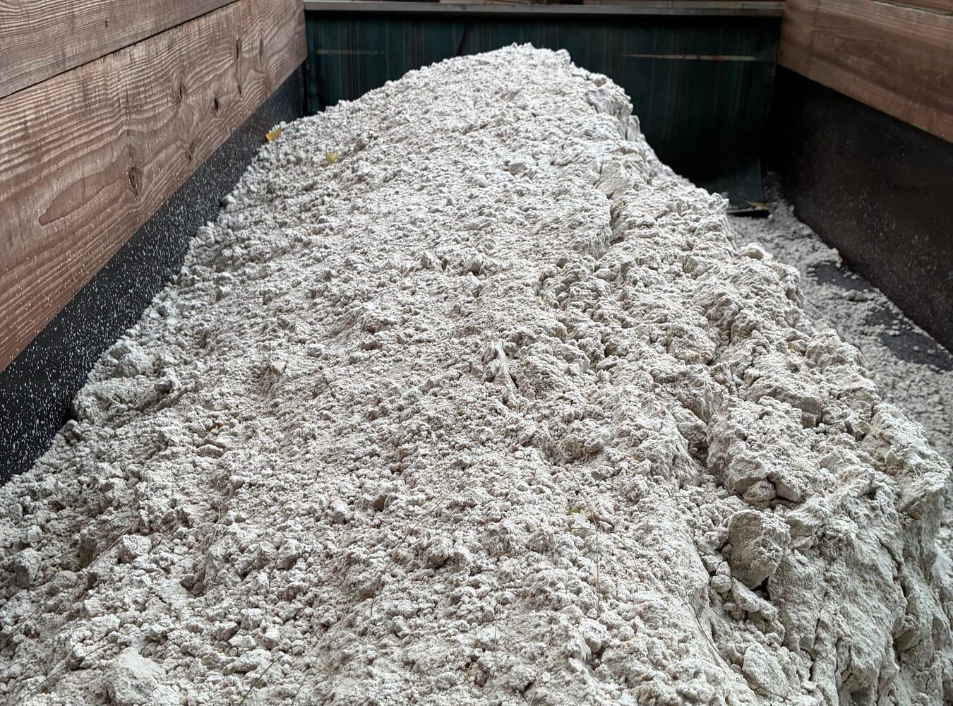 Load of septic sand in a truck bed