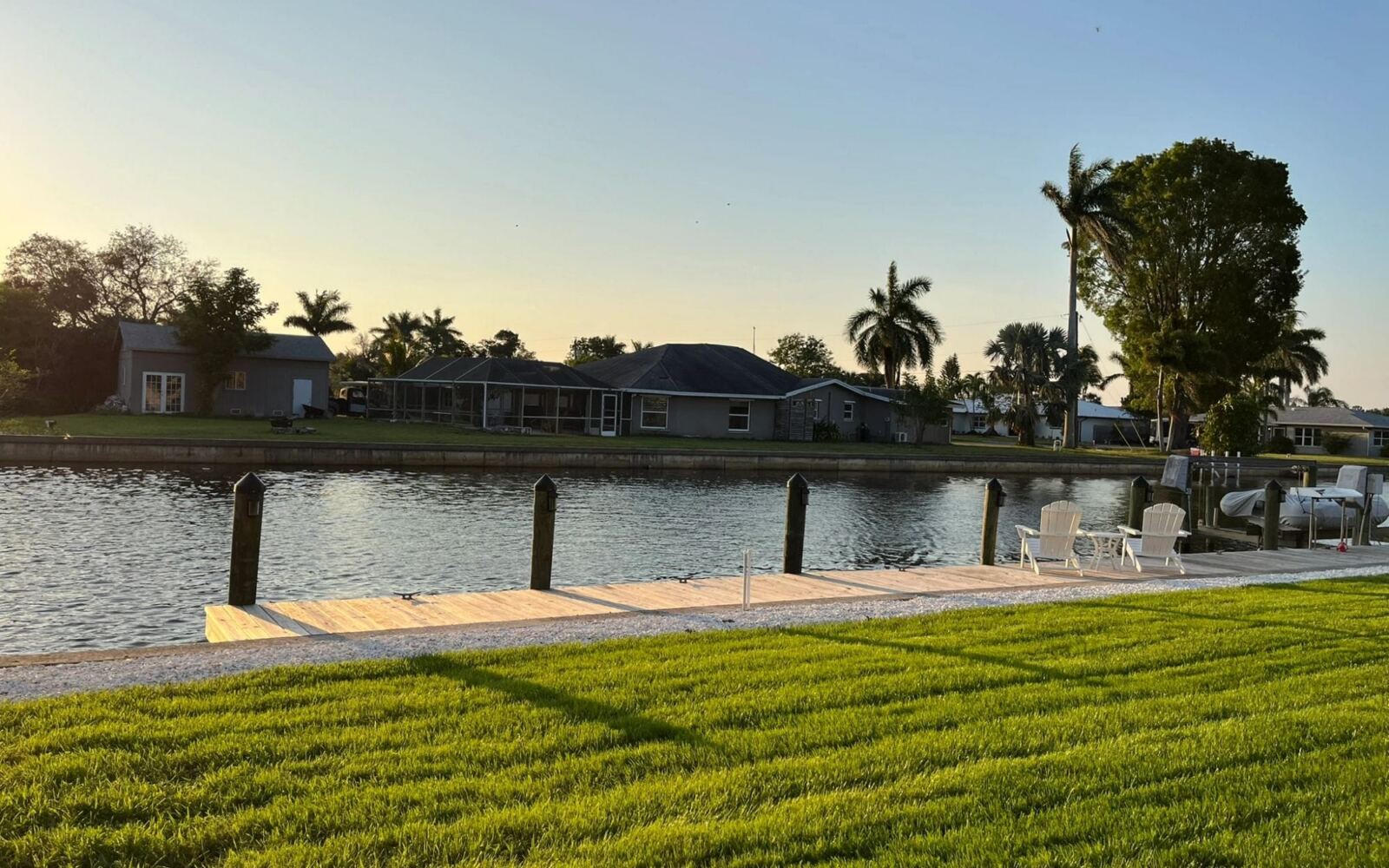 New sod lawn along a waterfront seawall